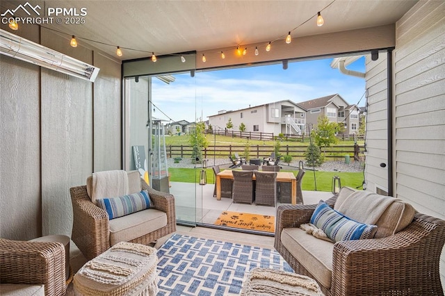 4932 Sand Canyon Trl, Colorado Springs, CO 80924 - sunroom with outdoor dining area, a residential view, rail lighting, and an outdoor hangout area
