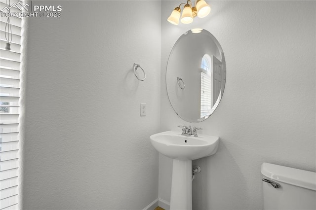 1118 Walters Pt, Monument, CO 80132 - half bathroom with toilet and baseboards