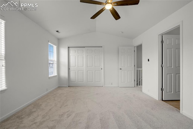 1118 Walters Pt, Monument, CO 80132 - unfurnished bedroom with lofted ceiling, carpet flooring, a closet, and a ceiling fan