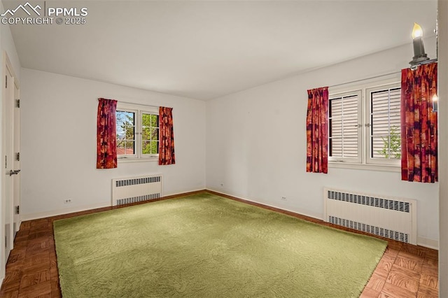 2126 Wood Ave, Colorado Springs, CO 80907 - spare room featuring radiator heating unit and baseboards