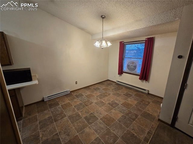 unfurnished dining area with a baseboard heating unit, a chandelier, and a textured ceiling