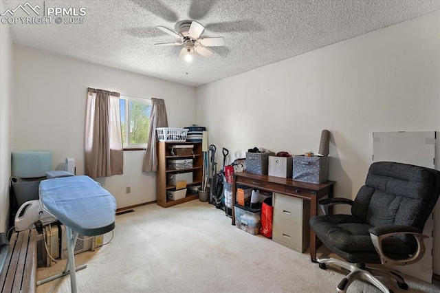 3425 Post Oak Dr, Colorado Springs, CO 80916 - office space featuring a ceiling fan, light colored carpet, and a textured ceiling