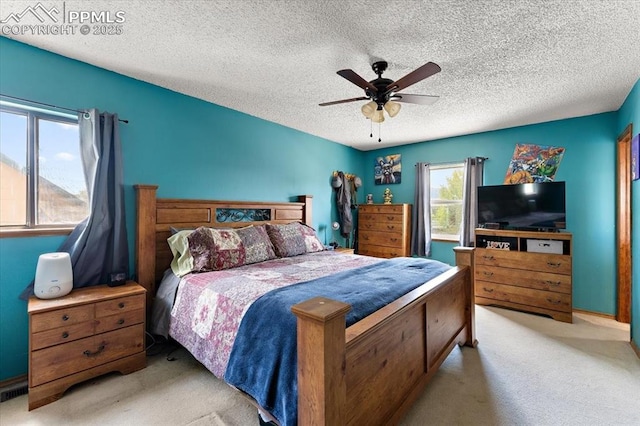 3425 Post Oak Dr, Colorado Springs, CO 80916 - carpeted bedroom with ceiling fan and a textured ceiling