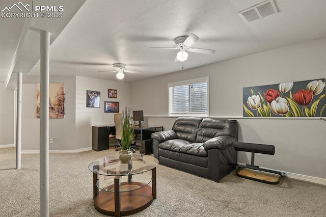 carpeted living area featuring ceiling fan, baseboards, and visible vents