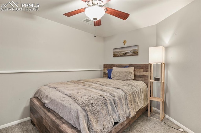 bedroom with ceiling fan, carpet floors, baseboards, and visible vents