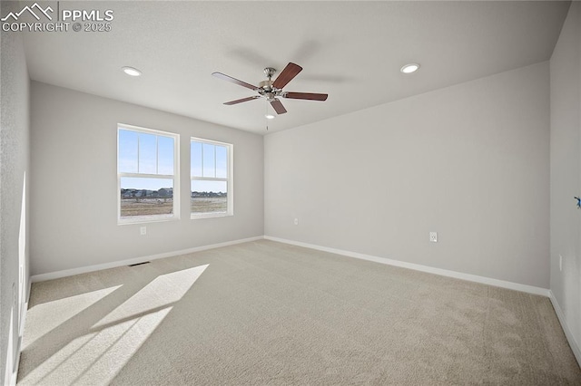 empty room featuring baseboards, recessed lighting, carpet flooring, and ceiling fan