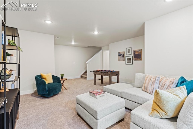 5131 Roundhouse Dr, Colorado Springs, CO 80925 - carpeted living room featuring stairway, baseboards, and recessed lighting