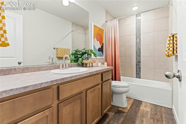 5131 Roundhouse Dr, Colorado Springs, CO 80925 - full bath with toilet, vanity, shower / bath combo with shower curtain, and wood finished floors