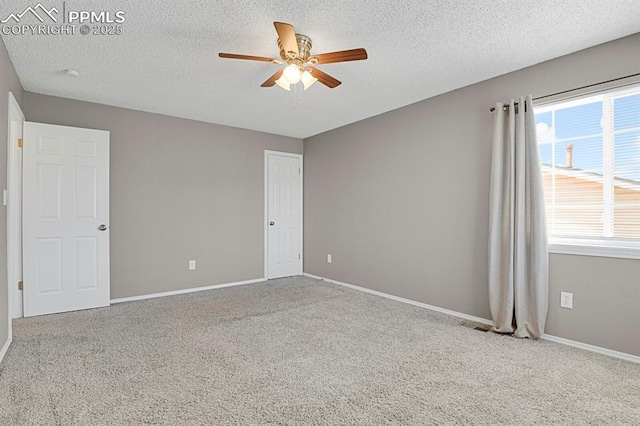 7920 Conifer Dr, Colorado Springs, CO 80920 - spare room with ceiling fan, carpet floors, a textured ceiling, and baseboards