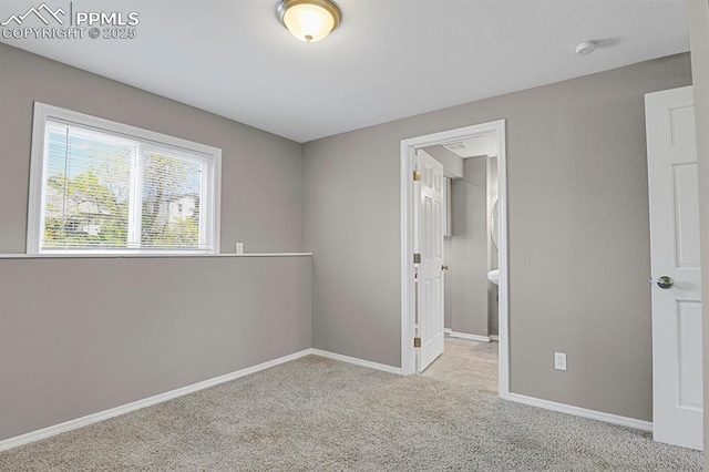 7920 Conifer Dr, Colorado Springs, CO 80920 - carpeted spare room featuring baseboards and a smoke detector