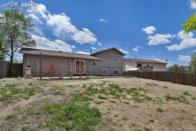 7920 Conifer Dr, Colorado Springs, CO 80920 - rear view of property with a fenced backyard