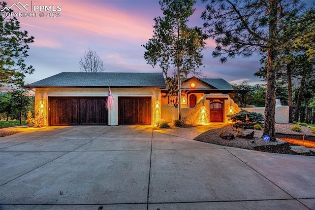 17995 Minglewood Trl, Monument, CO 80132 - view of front facade featuring concrete driveway and a garage