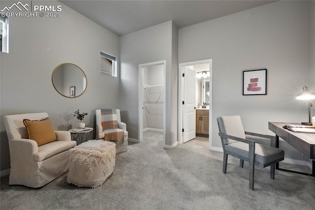 carpeted office space with baseboards