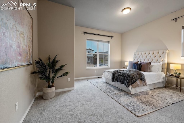 carpeted bedroom with baseboards