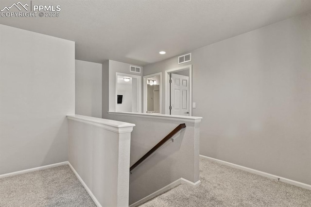 7238 Fauna Glen Dr, Colorado Springs, CO 80927 - corridor featuring carpet flooring, an upstairs landing, and recessed lighting