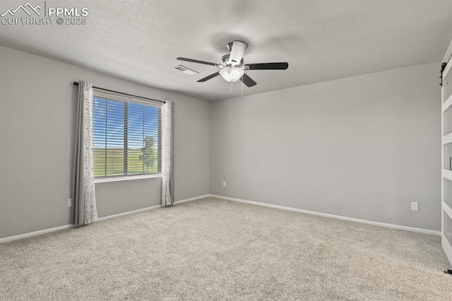 7238 Fauna Glen Dr, Colorado Springs, CO 80927 - carpeted empty room featuring a ceiling fan and a textured ceiling