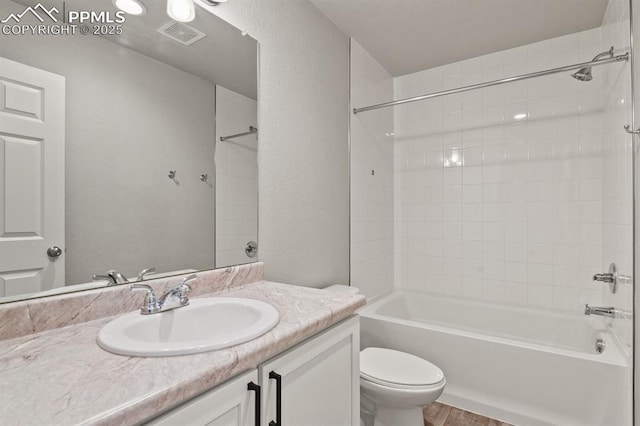 7238 Fauna Glen Dr, Colorado Springs, CO 80927 - bathroom with vanity, tub / shower combination, and wood finished floors