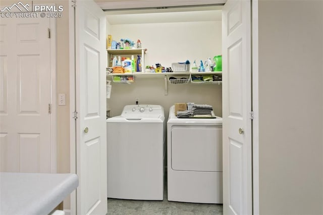 washroom featuring washer and dryer