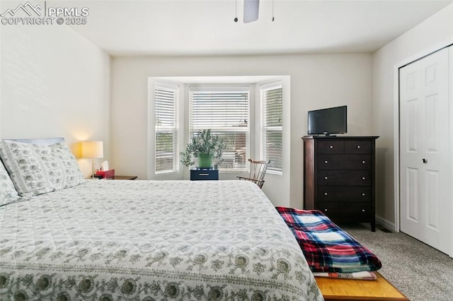 carpeted bedroom featuring a ceiling fan