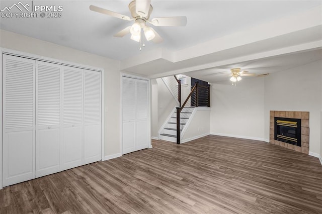 4650 Cassidy St, Colorado Springs, CO 80911 - unfurnished living room with stairway, ceiling fan, and wood finished floors