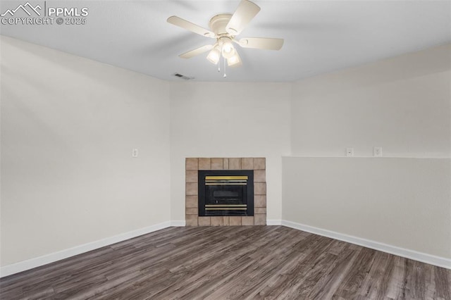 4650 Cassidy St, Colorado Springs, CO 80911 - unfurnished living room with a tile fireplace, visible vents, wood finished floors, and baseboards