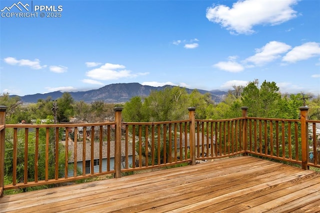 4650 Cassidy St, Colorado Springs, CO 80911 - wooden deck with a mountain view