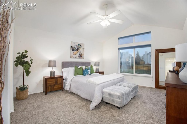 carpeted bedroom with lofted ceiling and a ceiling fan