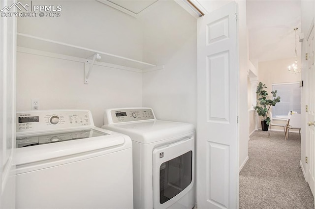 laundry room with washing machine and clothes dryer, carpet floors, and baseboards