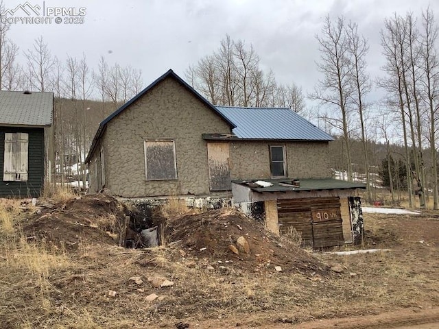 910 Victor Ave, Goldfield, CO 80860 - back of property with metal roof