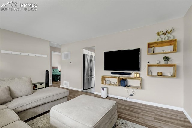 105 Easy St, Colorado Springs, CO 80911 - living room with wood finished floors and baseboards