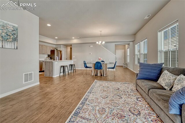 4342 Kaolin Ct, Colorado Springs, CO 80938 - living area featuring a chandelier, light wood finished floors, and recessed lighting