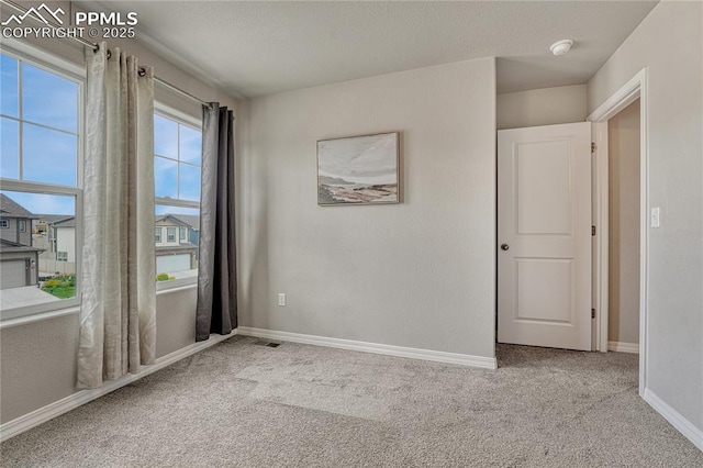 4342 Kaolin Ct, Colorado Springs, CO 80938 - carpeted spare room with a smoke detector and baseboards