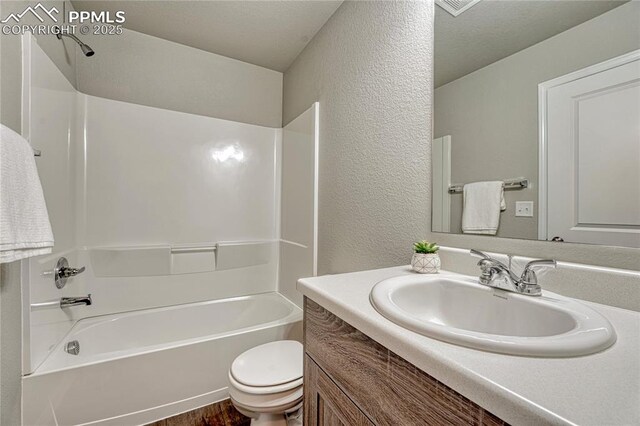 4342 Kaolin Ct, Colorado Springs, CO 80938 - full bathroom with vanity, bathtub / shower combination, and a textured wall