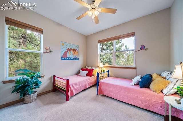8174 Inca Rd, Larkspur, CO 80118 - carpeted bedroom featuring baseboards and ceiling fan