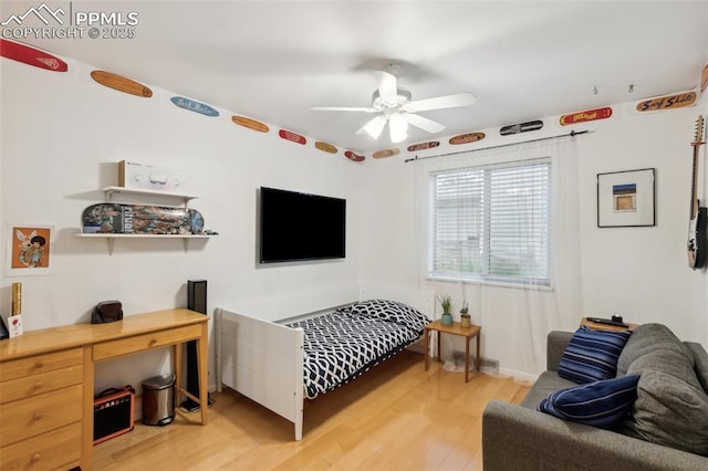 308 Sutherland Pl, Manitou Springs, CO 80829 - bedroom with light wood-style flooring and ceiling fan