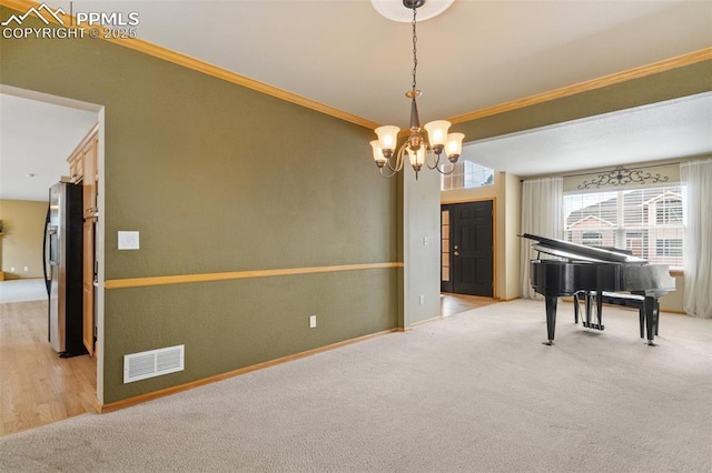 11985 Hanging Valley Way, Colorado Springs, CO 80921 - spare room featuring a chandelier, crown molding, light colored carpet, and baseboards