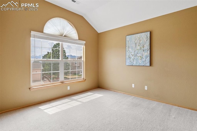 11985 Hanging Valley Way, Colorado Springs, CO 80921 - empty room with vaulted ceiling, carpet floors, and baseboards