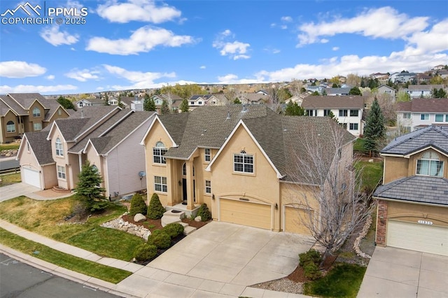 11985 Hanging Valley Way, Colorado Springs, CO 80921 - traditional-style home with a residential view and driveway