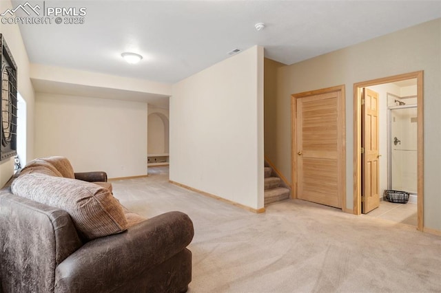 11985 Hanging Valley Way, Colorado Springs, CO 80921 - living area featuring carpet, stairway, and baseboards