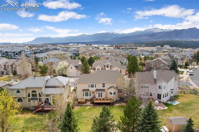 11985 Hanging Valley Way, Colorado Springs, CO 80921 - aerial perspective of suburban area featuring a mountainous background