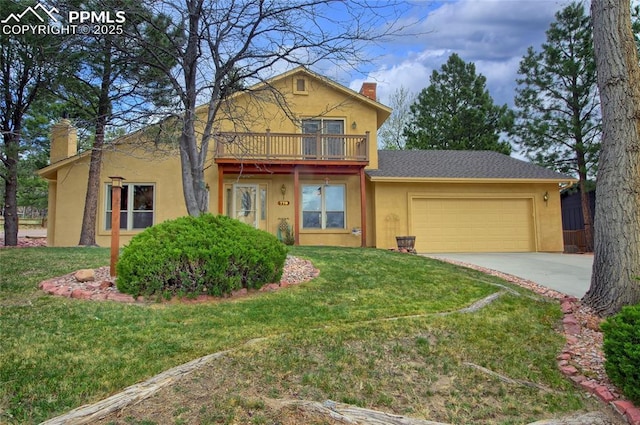 770 Allegheny Dr, Colorado Springs, CO 80919 - view of front facade with a chimney, stucco siding, an attached garage, a front yard, and concrete driveway