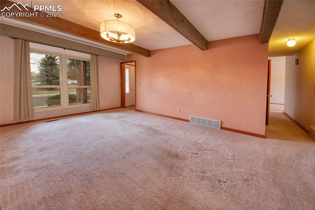 770 Allegheny Dr, Colorado Springs, CO 80919 - carpeted spare room featuring a textured ceiling, baseboards, and beam ceiling