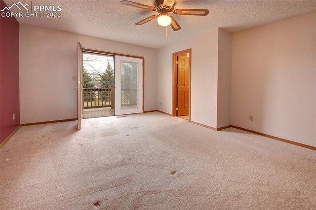 770 Allegheny Dr, Colorado Springs, CO 80919 - spare room featuring carpet, a textured ceiling, a ceiling fan, and baseboards