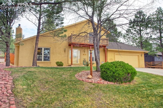 770 Allegheny Dr, Colorado Springs, CO 80919 - view of front of house featuring stucco siding, an attached garage, a balcony, a chimney, and concrete driveway