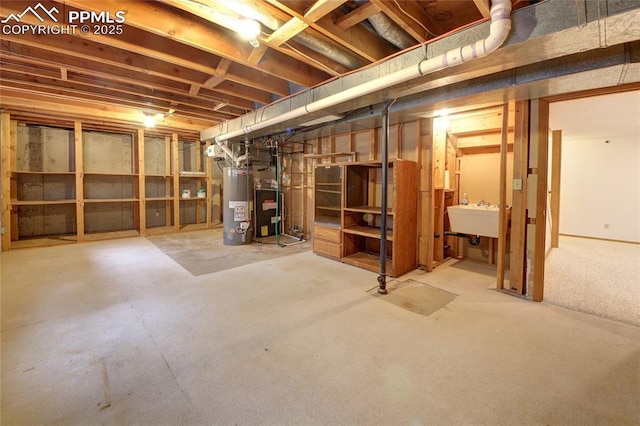 770 Allegheny Dr, Colorado Springs, CO 80919 - unfinished basement featuring gas water heater and a sink