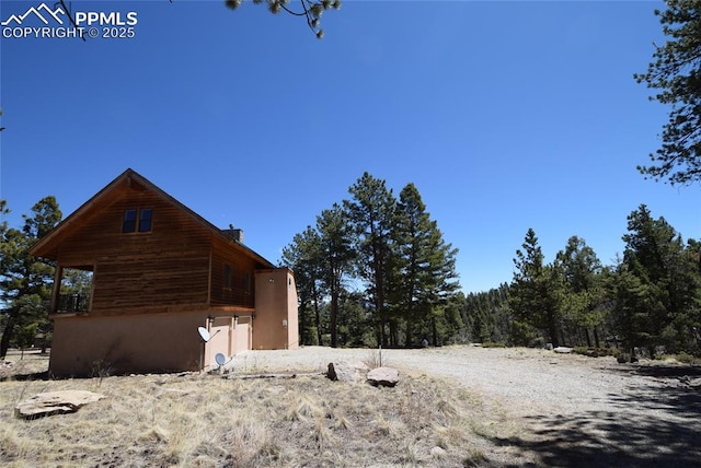 78 Powderhorn Ln, Florissant, CO 80816 - view of property exterior with a chimney