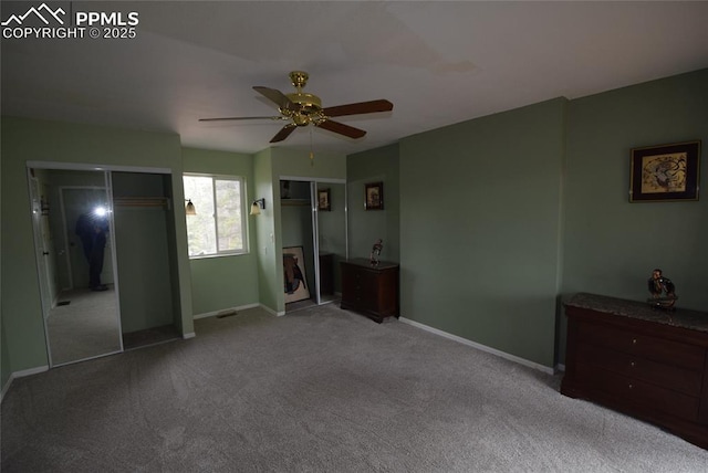 78 Powderhorn Ln, Florissant, CO 80816 - unfurnished bedroom featuring carpet floors, baseboards, two closets, and ceiling fan