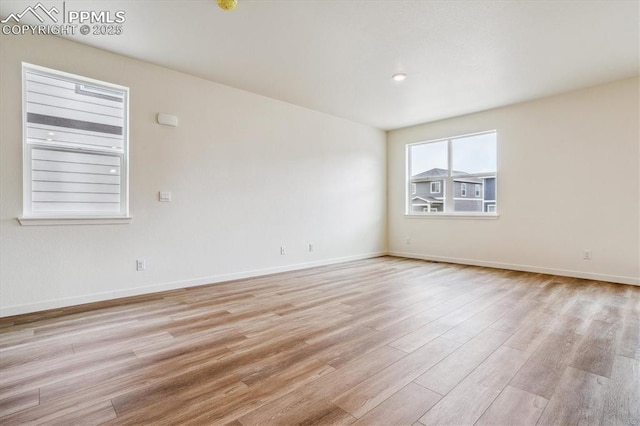 6745 Raven Ridge Ter, Colorado Springs, CO 80925 - empty room featuring baseboards and light wood-style floors