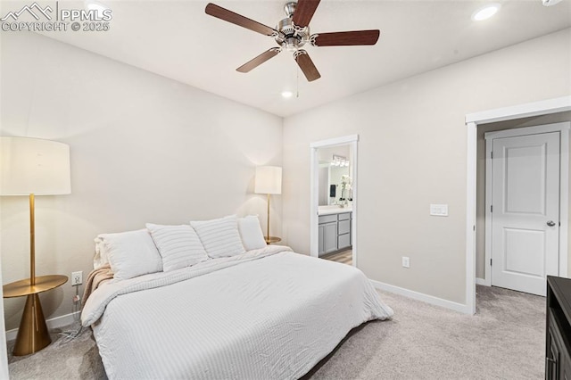 8093 Yellowleaf Pl, Colorado Springs, CO 80908 - bedroom with baseboards, connected bathroom, recessed lighting, and light colored carpet