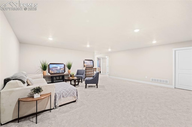 8093 Yellowleaf Pl, Colorado Springs, CO 80908 - living room with light colored carpet, baseboards, visible vents, and recessed lighting